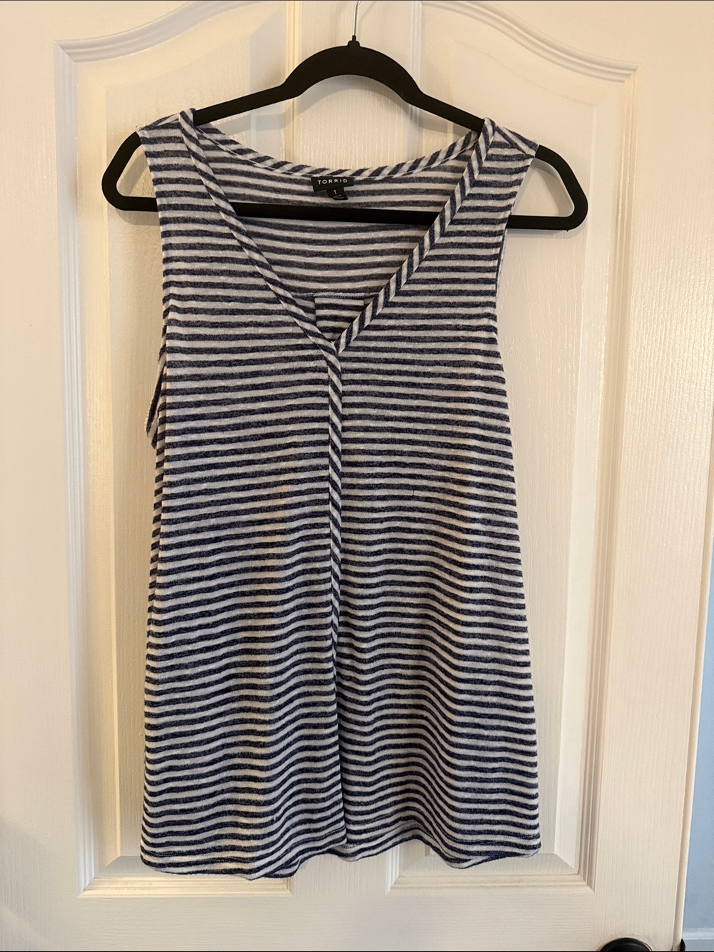 Torrid women's navy blue and white striped sleeveless jersey swing tank top.